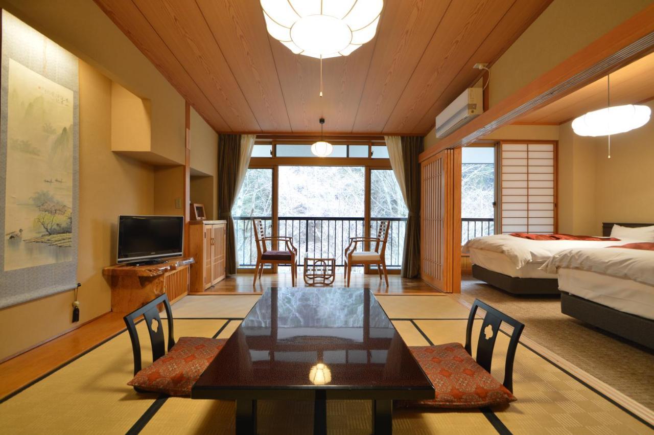 Kurokawa Onsen Oku No Yu Hotel Minamioguni Exterior foto
